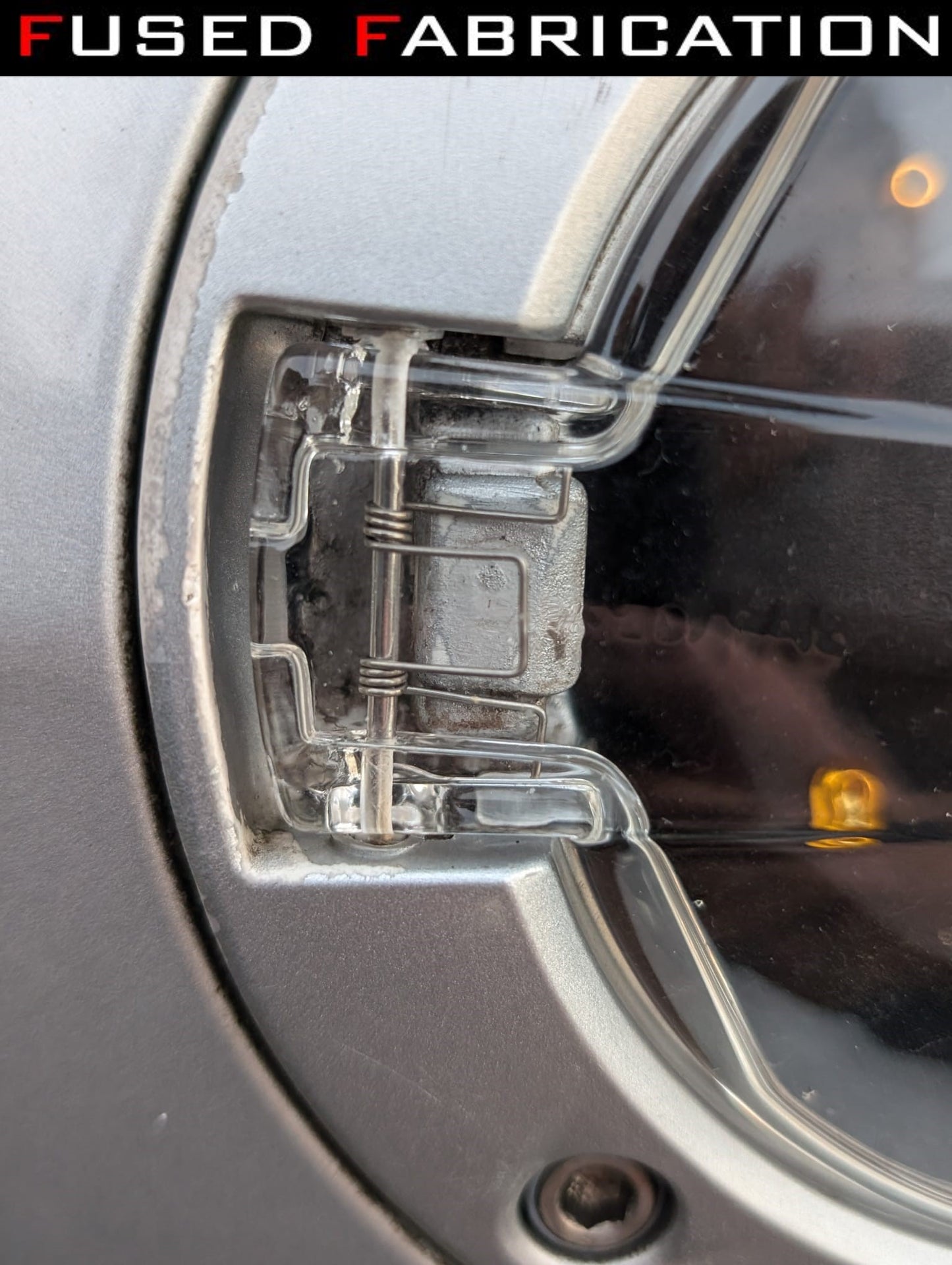 03-09 Clear Fuel Door